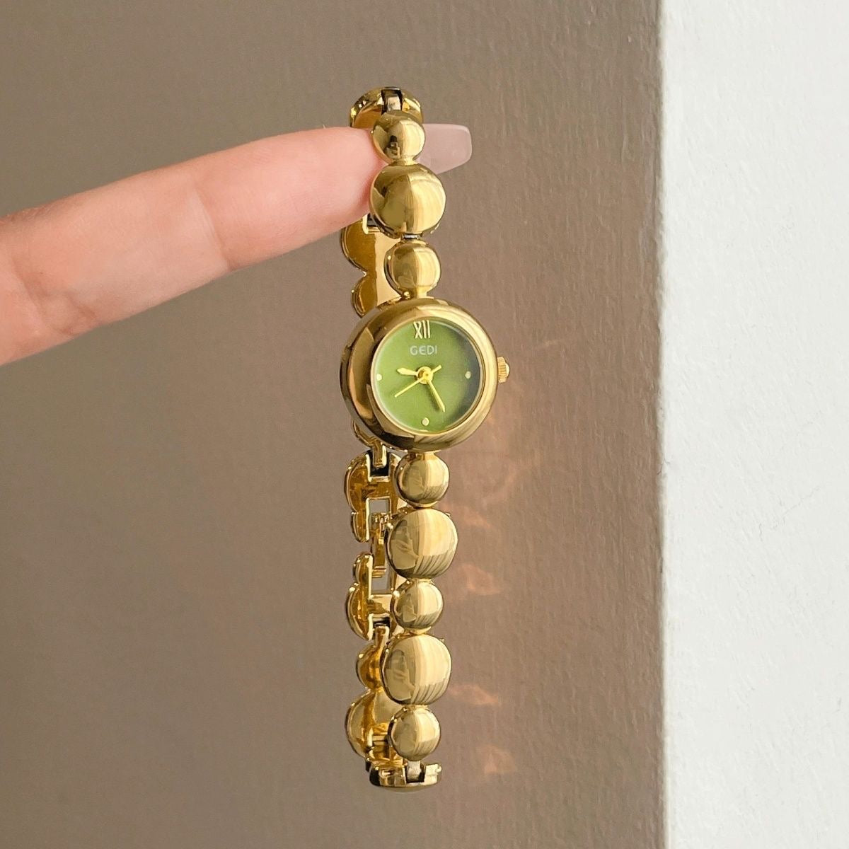 Dainty Round Face Golden Bracelet Watch