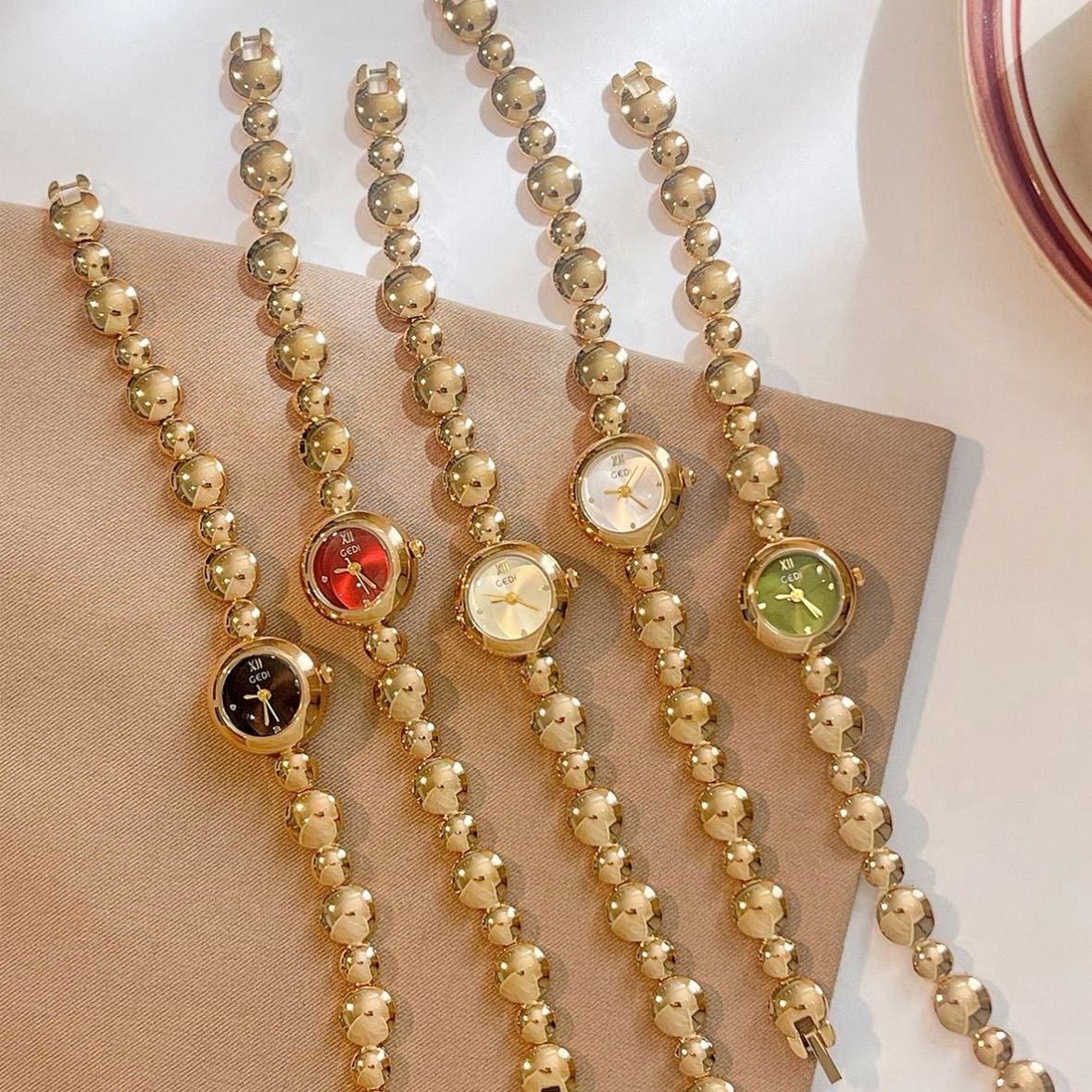 Dainty Round Face Golden Bracelet Watch