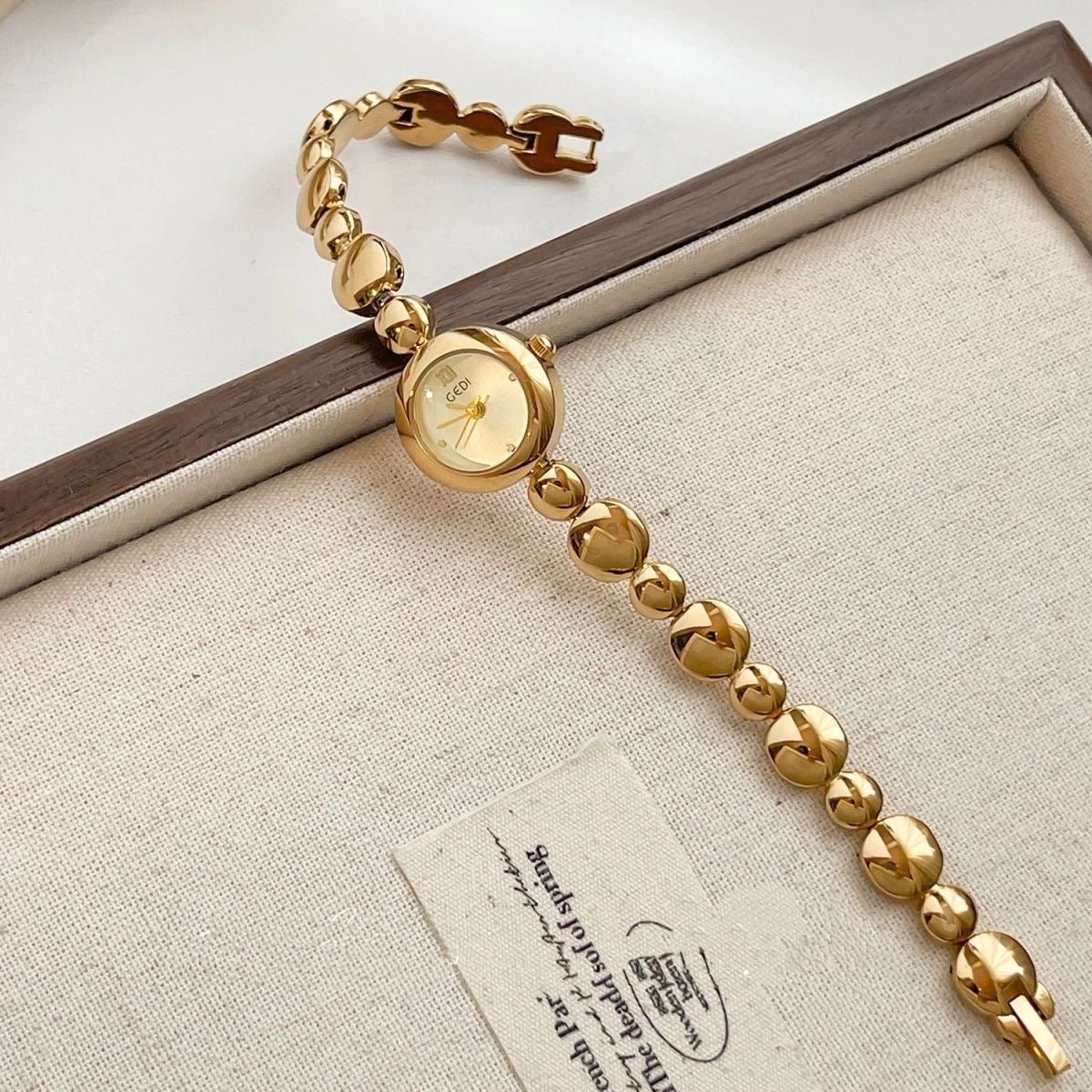 Dainty Round Face Golden Bracelet Watch